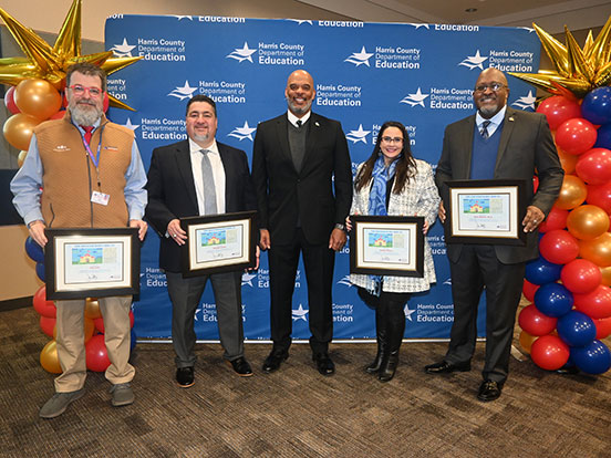  This is a photo of board members receiving recognition awards at a reception